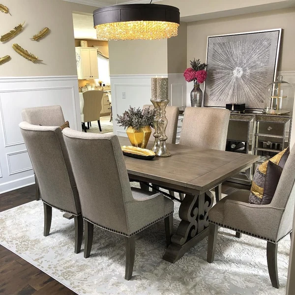 Elegant dining room with crystal chandelier and rug
