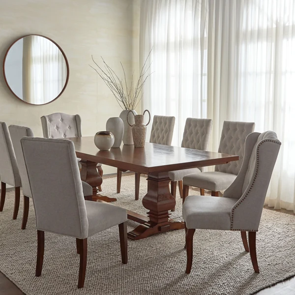 Large wooden pedestal table with tufted seating