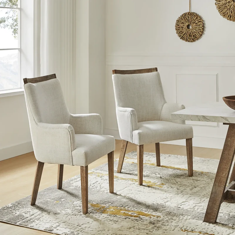 Pair of cream upholstered dining armchairs